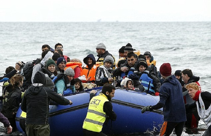 Nearly 700 migrants rescued at sea arrive in Italian port town